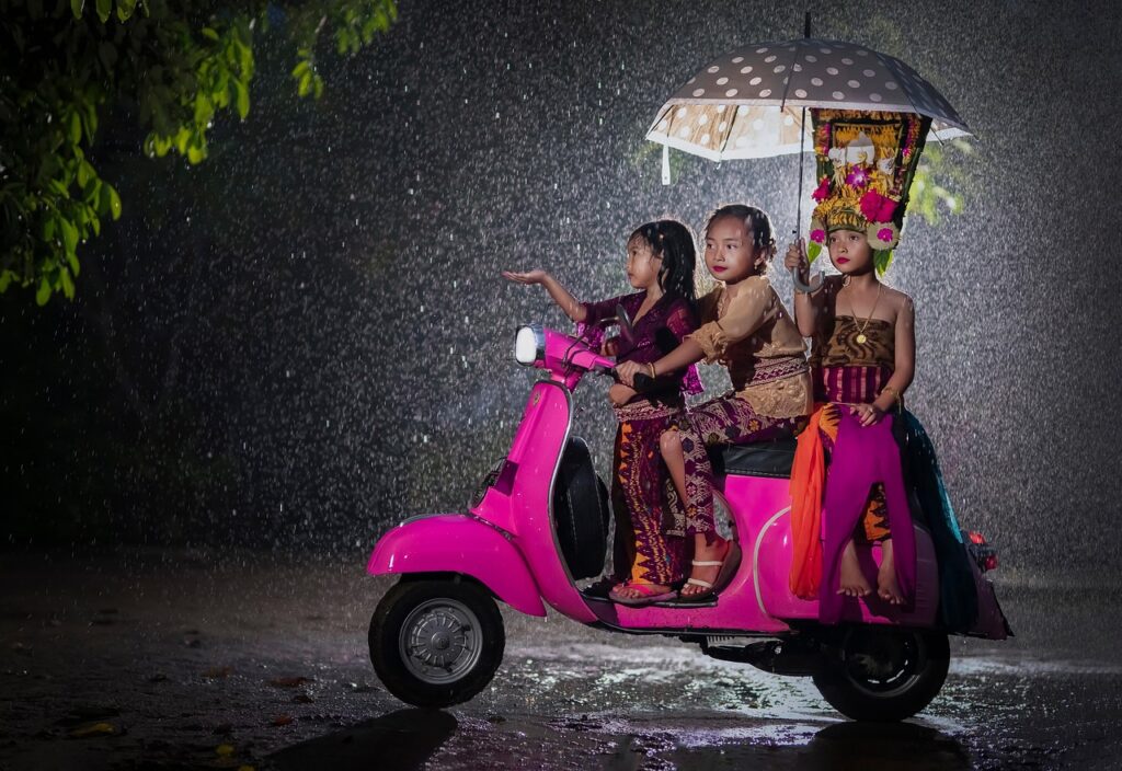 bali, raining, children, scooter, culture, tradition, ritual, traditional clothing, traditional fashion, night, evening, bali, bali, bali, bali, bali, scooter